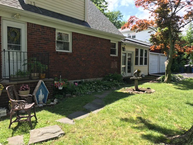 brick ranch, side yard, two car garage